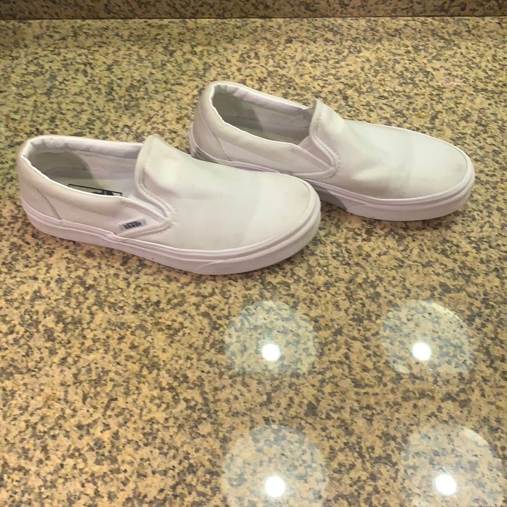 White slip on vans , womens size 8, hardley used